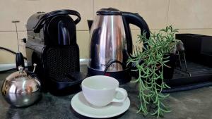 Coffee and tea making facilities at Apartman Riva