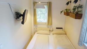 Łóżko lub łóżka w pokoju w obiekcie 1 Zimmer in Wohngemeinschaft, Netflix, Premium Kabelfernsehen, küche