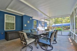 a dining room with a table and chairs at 8 Beds In 4br Home W Hot Tubfamily & Work-ready in Macon