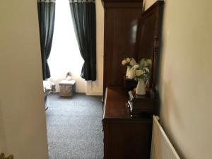 Postel nebo postele na pokoji v ubytování Captivating 2-Bed Apartment in Isle of Bute