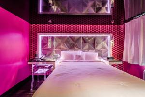 Postel nebo postele na pokoji v ubytování Olux Hotel-Motel-Suites + 60 fotografií