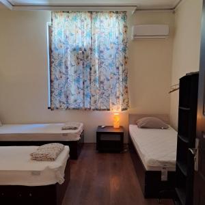 Giường trong phòng chung tại Ivory Tower Hostel