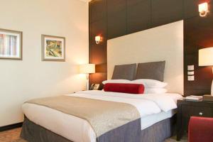 Katil atau katil-katil dalam bilik di Century Hotel Doha