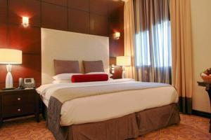 Katil atau katil-katil dalam bilik di Century Hotel Doha