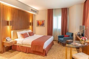 Katil atau katil-katil dalam bilik di Century Hotel Doha