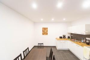 Кухня или мини-кухня в Große Wohnung für bis zu 8 Gäste
