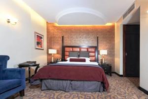 Katil atau katil-katil dalam bilik di Century Hotel Doha