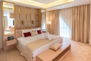 Katil atau katil-katil dalam bilik di Century Hotel Doha