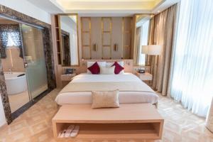Katil atau katil-katil dalam bilik di Century Hotel Doha