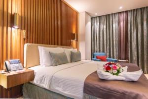 Katil atau katil-katil dalam bilik di Century Hotel Doha