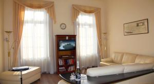 A television and/or entertainment centre at Classic Central Apartment