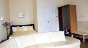 A bed or beds in a room at Classic Central Apartment
