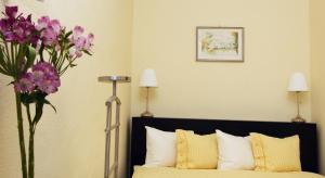 A bed or beds in a room at Classic Central Apartment