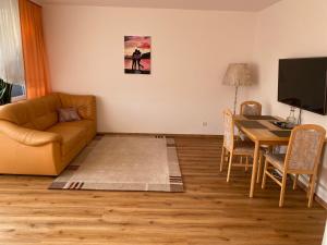 TV a/nebo společenská místnost v ubytování Marl Central Apartment