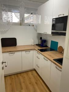 Kuchyň nebo kuchyňský kout v ubytování Marl Central Apartment