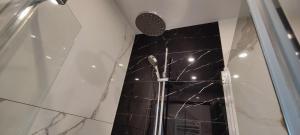 Koupelna v ubytování XuBa ApartmentRooms Messe Wien Prater