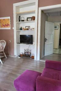 Μια τηλεόραση ή/και κέντρο ψυχαγωγίας στο Apartman Central