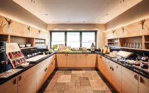 Cucina o angolo cottura di Biancaneve Family Hotel