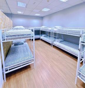 Postel nebo postele na pokoji v ubytování Hostel Acacias