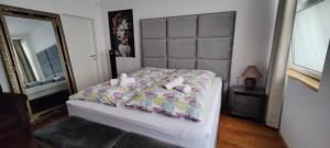 Postel nebo postele na pokoji v ubytování XuBa ApartmentRooms Messe Wien Prater