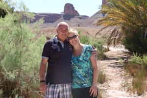 a man and woman posing for a picture in the desert at Riad Les Chtis D'Agadir in Agadir