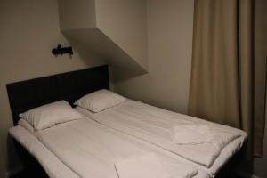 Postel nebo postele na pokoji v ubytování Hotel Hötorget
