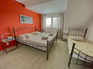 Ένα ή περισσότερα κρεβάτια σε δωμάτιο στο Penzion Schwarzava