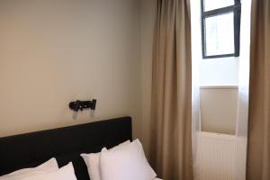 Postel nebo postele na pokoji v ubytování Hotel Hötorget