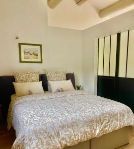 Katil atau katil-katil dalam bilik di Appartement neuf et au calme proche Avignon