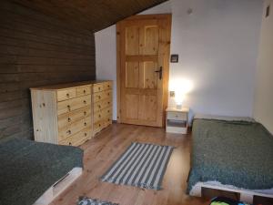 Postel nebo postele na pokoji v ubytování Chata Parnica v objeti slovenskych hor