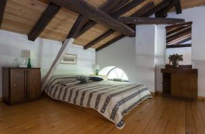 Postel nebo postele na pokoji v ubytování To Spitaki Apartments
