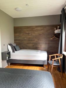 Postel nebo postele na pokoji v ubytování Haukaberg House