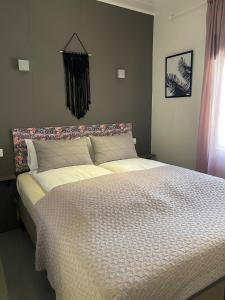 Postel nebo postele na pokoji v ubytování Haukaberg House