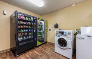 a refrigerator and a washing machine in a room at Extended Stay America Suites - Minneapolis - Eden Prairie - Technology Drive in Eden Prairie