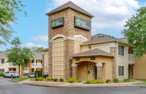 a hotel building with a sign on top of it at Extended Stay America Suites - Nashville - Franklin - Cool Springs in Franklin