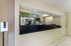 a hotel lobby with a reception desk with a mirror at Extended Stay America Suites - Nashville - Franklin - Cool Springs in Franklin