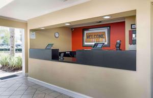 a lobby of a hotel with a welcome counter at Extended Stay America Suites - Orange County - Irvine Spectrum in Irvine