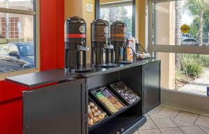 a counter with a coffee machine on top of it at Extended Stay America Suites - Orange County - Irvine Spectrum in Irvine