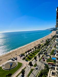 a view of a beach and the ocean at VISTAMAR CORACEROS VIÑA DEL MAR in Viña del Mar