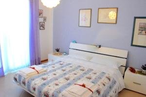 Postel nebo postele na pokoji v ubytování Orchidea apartments + 37 fotografií