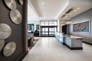 a lobby with a reception desk in a building at TownePlace Suites by Marriott Boston Logan Airport/Chelsea in Chelsea