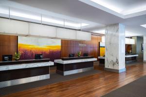 a lobby of a hotel with a reception desk at The Westin Michigan Avenue Chicago in Chicago