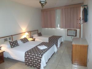 Cama o camas de una habitación en Hotel Rondônia Palace