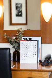 Sydney Harbour Hotelにあるテレビまたはエンターテインメントセンター