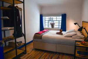 Cama o camas de una habitación en Saqray Hostel
