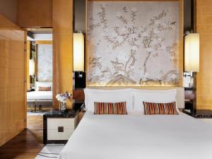 Llit o llits en una habitació de The Olympian Hong Kong