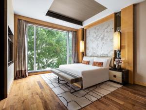 Llit o llits en una habitació de The Olympian Hong Kong