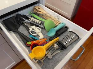 a drawer with a bunch of tools in it at The Corner Cottage in El Centro