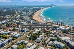 an aerial view of a beach and the ocean at LEO2-SOPHISTICATED, BEACH HOLIDAY HOME in Alexandra Headland