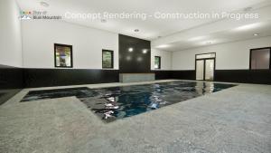 a large room with a pool in the middle at Claire Glen in Blue Mountains